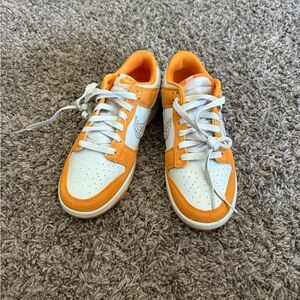 Nike Dunk Low - orange w/ cheetah print logo - never worn w/o box. Size 7M